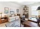 Home office with a large desk, couch, and bookshelves at 15 Lakeside Way, Cartersville, GA 30121