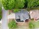 Aerial view of the property showcasing the home's layout and manicured landscaping at 200 Ridge Bluff Ln, Suwanee, GA 30024