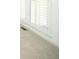 Cozy bedroom featuring neutral carpet and white shuttered windows at 200 Ridge Bluff Ln, Suwanee, GA 30024
