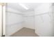 Walk-in closet has built-in wire shelving at 200 Ridge Bluff Ln, Suwanee, GA 30024