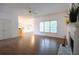 Bright living room with a fireplace and hardwood floors at 200 Ridge Bluff Ln, Suwanee, GA 30024