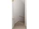 Carpeted staircase with white railing, providing safe and stylish access between levels at 200 Ridge Bluff Ln, Suwanee, GA 30024