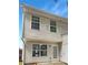 Back exterior featuring neutral vinyl siding and lots of windows for natural light at 453 Inkberry Dr, Atlanta, GA 30349
