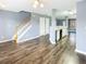 Living space with hardwood floors, stairs, and an eat-in kitchen at 453 Inkberry Dr, Atlanta, GA 30349
