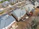 Aerial shot of the backyard showing the multi-level deck and patio of this beautiful two-story brick home at 822 Pistace Ct, Alpharetta, GA 30022