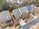 An aerial view captures the home's exterior and surrounding neighborhood, highlighting curb appeal and landscaping at 822 Pistace Ct, Alpharetta, GA 30022