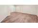 Basement features hardwood floors, neutral walls, and access to the upper levels of the home at 822 Pistace Ct, Alpharetta, GA 30022