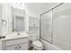 The white bathroom is a lovely, clean design at 822 Pistace Ct, Alpharetta, GA 30022