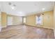 Spacious living room has hardwood floors and lots of natural light at 822 Pistace Ct, Alpharetta, GA 30022
