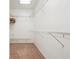Walk-in closet features white wire shelving units at 822 Pistace Ct, Alpharetta, GA 30022