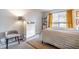 Comfortable bedroom with a cozy rug, modern furniture and view to the exterior at 101 Fair Haven Se Way, Smyrna, GA 30080