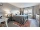 Inviting bedroom with a window, rug, table and decor at 101 Fair Haven Se Way, Smyrna, GA 30080