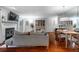 Hardwood floors in dining area with open access to the kitchen and living room at 101 Fair Haven Se Way, Smyrna, GA 30080