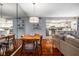 Open floor plan featuring living, dining, and kitchen area with hardwood floors at 101 Fair Haven Se Way, Smyrna, GA 30080