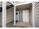 Exterior doorway with unit numbers and storm door with wreath at 101 Fair Haven Se Way, Smyrna, GA 30080