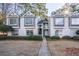 Attractive townhouse with neutral siding, dark trim, and well-maintained landscaping at 101 Fair Haven Se Way, Smyrna, GA 30080