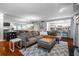 Open concept living area with modern decor and hardwood flooring at 101 Fair Haven Se Way, Smyrna, GA 30080