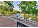 Picturesque pond with benches surrounded by mature trees and a walking trail at 101 Fair Haven Se Way, Smyrna, GA 30080