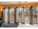 Cozy sunroom area with large sliding glass doors that look out on the backyard at 101 Fair Haven Se Way, Smyrna, GA 30080