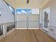 This home boasts a lovely outdoor deck, perfect for relaxing or entertaining with its wooden flooring and serene ambiance at 4024 Hosch Retreat Dr, Buford, GA 30519