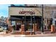 Charming restaurant building featuring brick accents, a covered entrance, and large windows at 16 Jacobs Farm Ln # 8, Lawrenceville, GA 30045