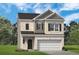 Charming two-story home with a brick facade and attached two-car garage at 720 Shetland Trl, Cartersville, GA 30121