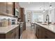 Modern kitchen featuring stainless steel appliances and an island with a breakfast bar at 720 Shetland Trl, Cartersville, GA 30121