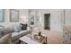 An open living space that is comfortably furnished and has lots of natural light at 720 Shetland Trl, Cartersville, GA 30121