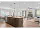 Open-concept living room and kitchen area perfect for entertaining guests at 720 Shetland Trl, Cartersville, GA 30121