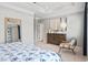 Beautifully decorated main bedroom featuring a dresser, neutral walls, a chair, and great natural light at 720 Shetland Trl, Cartersville, GA 30121