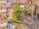 Aerial view of a fenced backyard with a wooden deck and an above-ground pool at 1408 Lake Paradise Rd, Villa Rica, GA 30180