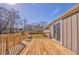 Large wooden back deck perfect for outdoor entertaining and gatherings at 1408 Lake Paradise Rd, Villa Rica, GA 30180