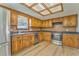 Bright kitchen featuring stainless steel appliances, ample counter space, and wooden cabinetry at 1408 Lake Paradise Rd, Villa Rica, GA 30180