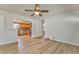 Open-concept living room flows into the kitchen with a breakfast bar and stainless steel appliances at 1408 Lake Paradise Rd, Villa Rica, GA 30180