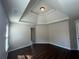Bedroom highlighting decorative tray ceiling, hardwood floors, and recessed lighting at 651 Deer Springs Way, Loganville, GA 30052