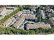 Aerial view of a well-maintained apartment complex and lush green landscape in a suburban setting at 2700 Pine Tree Ne Rd # 4006, Atlanta, GA 30324