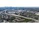 An aerial view of the property with a major highway, shopping center, and the Atlanta skyline at 2700 Pine Tree Ne Rd # 4006, Atlanta, GA 30324