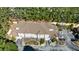 Bird's eye view of the townhome community, lush greenery, parking spots, and building roof designs at 2700 Pine Tree Ne Rd # 4006, Atlanta, GA 30324