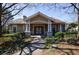 Community clubhouse showcasing elegant architecture, beautiful landscaping, and a welcoming entrance at 2700 Pine Tree Ne Rd # 4006, Atlanta, GA 30324