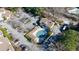 An aerial shot of the community pool in the complex, surrounded by a parking lot and landscaping at 2700 Pine Tree Ne Rd # 4006, Atlanta, GA 30324