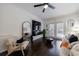 Comfortable living room with hardwood floors, and patio doors that allow plenty of natural light at 2700 Pine Tree Ne Rd # 4006, Atlanta, GA 30324
