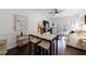 Open-concept living room and dining area features contemporary decor and plenty of natural light at 2700 Pine Tree Ne Rd # 4006, Atlanta, GA 30324