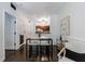 Open-concept dining area with bar seating that flows into the kitchen, creating an inviting space at 2700 Pine Tree Ne Rd # 4006, Atlanta, GA 30324