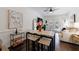 Open-concept living room and dining area features contemporary decor and plenty of natural light at 2700 Pine Tree Ne Rd # 4006, Atlanta, GA 30324