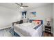 Bedroom boasts hard floors, a ceiling fan and a large window allowing for natural light at 3457 Scenic Dr, East Point, GA 30344
