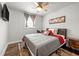 Bedroom with a ceiling fan, hard wood floors, and a view of the desk at 3457 Scenic Dr, East Point, GA 30344