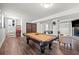 Spacious game room with pool table, fireplace and cozy seating area at 3457 Scenic Dr, East Point, GA 30344