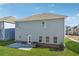 Backyard featuring a concrete patio and green grass at 744 Clark Lake Estates Dr, Grayson, GA 30017