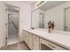 Bathroom featuring a large vanity with plenty of counter space and a walk-in shower at 175 Lagrange Ct, Fayetteville, GA 30214