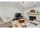 Inviting living room features a cozy fireplace and modern furnishings at 175 Lagrange Ct, Fayetteville, GA 30214